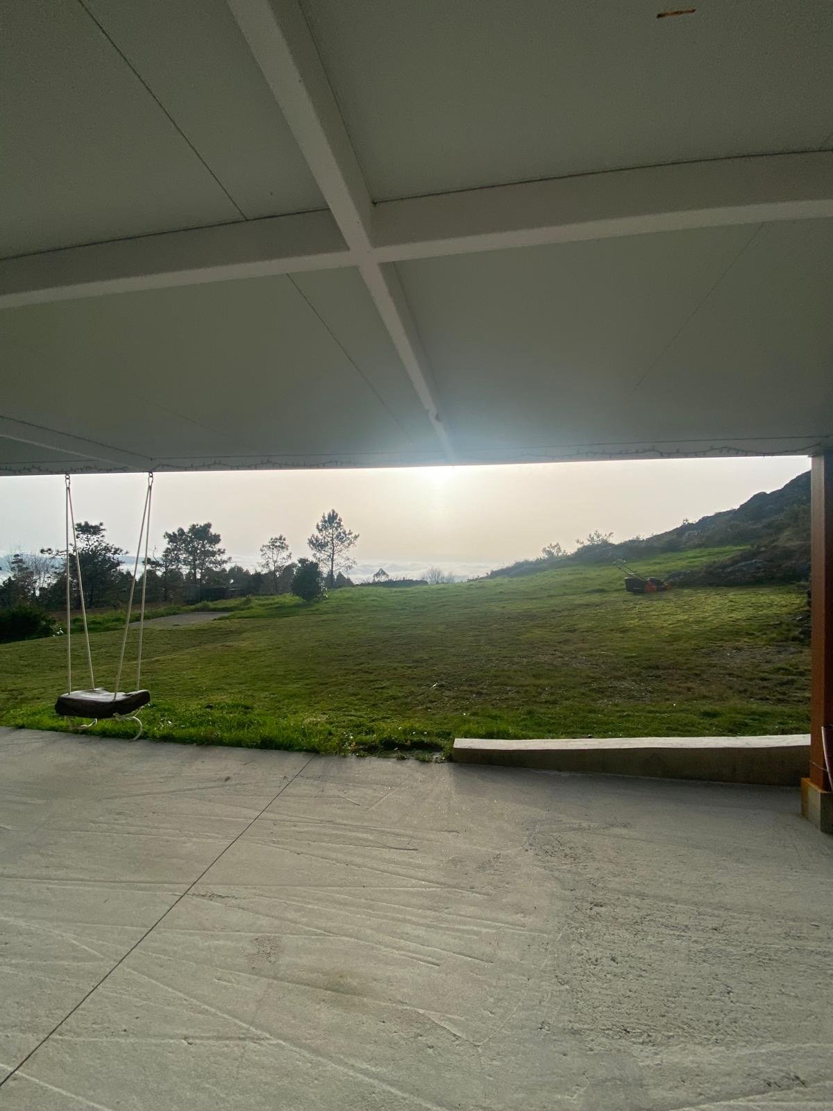 Terraza con columpio